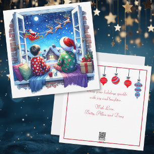 Kinder sehen Weihnachten am Heiligen Abend