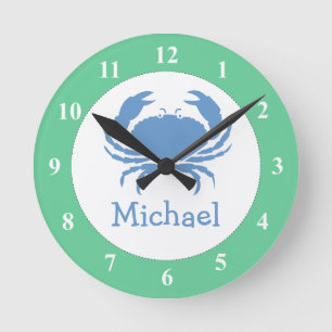 Kinderzimmer-Wanduhr mit blauer Krabbe und Babynam Runde Wanduhr