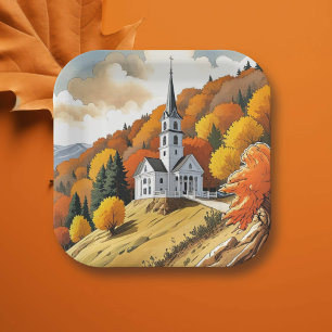 Kirche auf einem Hügel im Herbst Pappteller