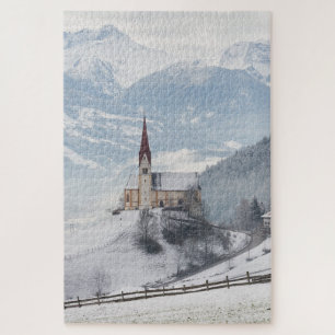 Kirche in einer alpinen Winterlandschaft Puzzle