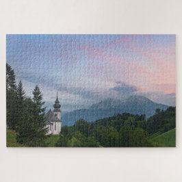 Kirche mit den Alpen Berge bei Sonnenuntergang Puzzle
