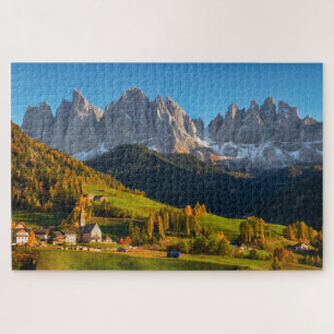 Kirche und Dorf mit Berglandschaft Puzzle