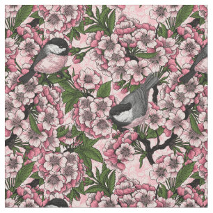 Kirschblüte und Kichererbsen auf rosa Stoff