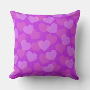 Kissen mit rosa Herzen in kräftiger Farbe