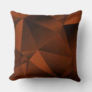 Kissen mit rostroter facettierter geometrischer Di