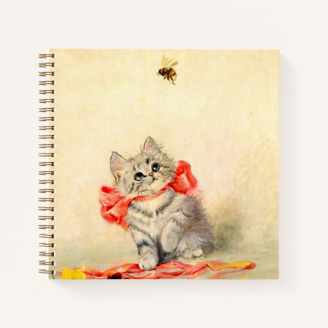 Kitten mit einem roten Band Notizbuch (Vorderseite)