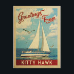 Kitty Hawk Sailboat North Carolina Vintage Reise Postkarte<br><div class="desc">Diese Grüße von Kitty Hawk North Carolina Vintage Reise nautische Design verfügt über ein Boot Segelboot auf dem Wasser mit Möwen und einen blauen Himmel gefüllt mit prächtigen puffigen weißen Wolken.</div>