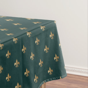 Klassisch goldfarbene Lilie auf dunkelmeergrün Tischdecke