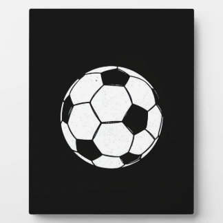 Klassischer Vintage-Fußball mit abgenutzter Sporti Fotoplatte