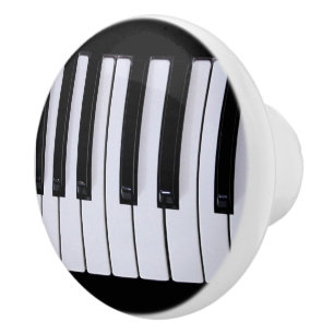 Klavier befestigt Schwarzweiss Keramikknauf