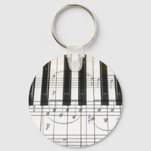 Klavier-Tastatur und Musiknoten Schlüsselanhänger