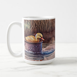 Kleine gelbe Entenpiele in Eimer Kaffeetasse