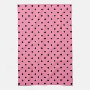 Kleine schwarze Polka Punkte auf heißen rosa Handtuch