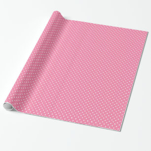 Kleine weiße Polka Punkte auf heißen rosa Geschenkpapier
