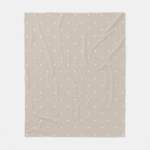 Kleine weiße Tupfen auf kühlem Beige oder Greige