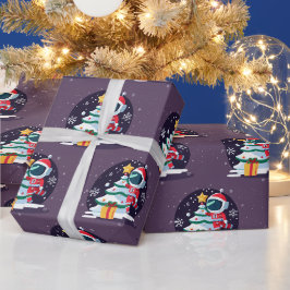Kleiner Astronaut dekoriert Weihnachtsbaum Geschenkpapier