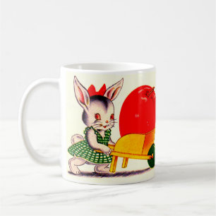 kleiner Hasen, der mit einem großen Apfel den Wage Tasse