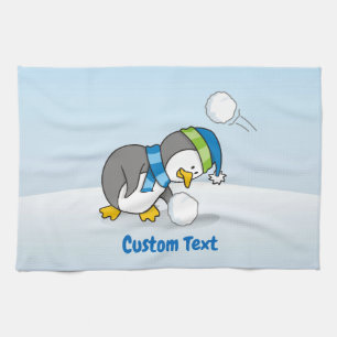 Kleiner Pinguin bekommt ein Schneeballhandtuch Geschirrtuch
