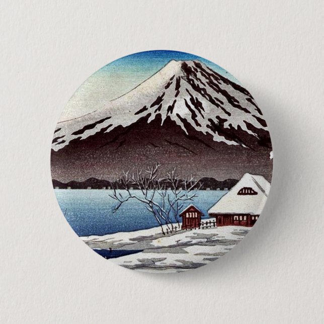 Kleiner Schnee bedeckte Gebäude auf der Küste Button (Vorderseite)