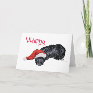 Kleiner Scottie Hund wartet auf den Weihnachtsmann Feiertagskarte