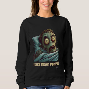 Kleiner verängstigter Zombie im Bett kann tote Men Sweatshirt