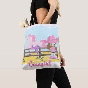Kleines Cowgirl mit Pferd und Satteltasche