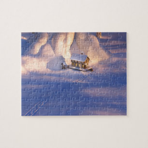 Kleines Haus im Schneepuzzle Puzzle