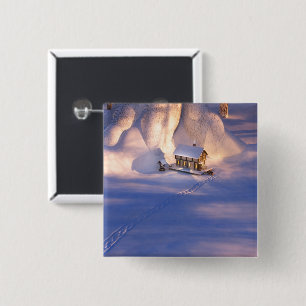 Kleines Haus in der Schneeknöpfe Button