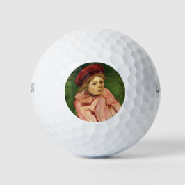 Kleines Mädchen in einem roten Beret Golfball