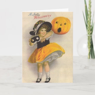 Kleines Mädchen mit Pumpkin und Maske Karte