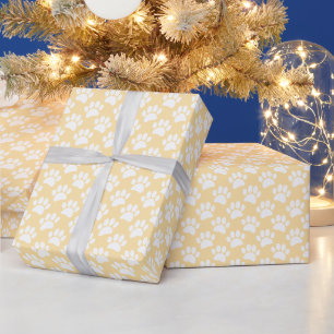 Kleines Muster mit Hundepfotenabdrücken in Weiß un Geschenkpapier
