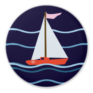 Kleines rotes Segelboot Keramikknauf