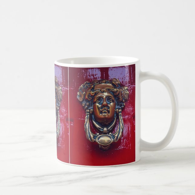 "KNOCKER DER BREMSEN-KOPFSCHEIBE AN DER HELLEN ROT KAFFEETASSE (Rechts)