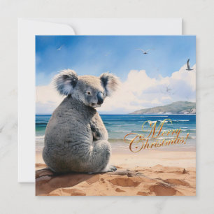 Koala an einem sandigen Strand Frohe Weihnachten