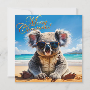 Koala an einem sandigen Strand Frohe Weihnachten