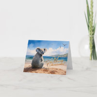 Koala an einem sandigen Strand Frohe Weihnachten