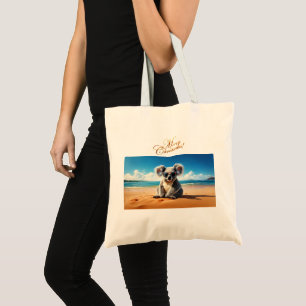 Koala an einem Sandstrand Frohe Weihnachten Tragetasche