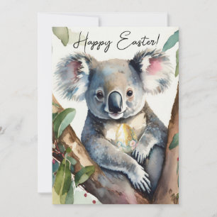 Koala-Bär, der ein goldenes Ostereier hält Feiertagskarte