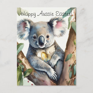 Koala-Bär, der ein goldenes Ostereier hält Postkarte