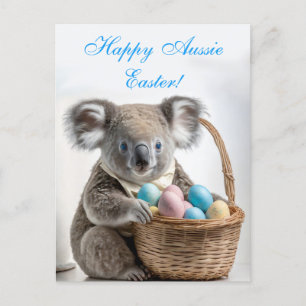 Koala-Bär hält einen Korb mit Ostereiern Feiertagspostkarte
