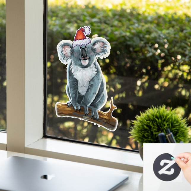 Koala-Bär in einer Weihnachtsmannmütze Fensteraufkleber (Büro)