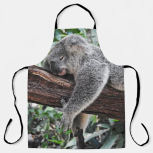 KOALA-BÄR SCHLÄFT AUF EINEM BAUM SCHÜRZE