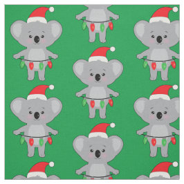 Koala in Weihnachtsmannmütze und Weihnachtsdekorat Stoff