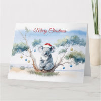 Koala sitzt in einem Kaugummi-Baum Frohe Weihnacht