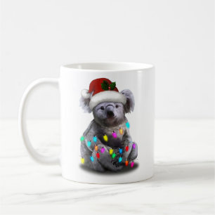 Koala sitzt mit Weihnachten Weihnachten Weihnachte Kaffeetasse