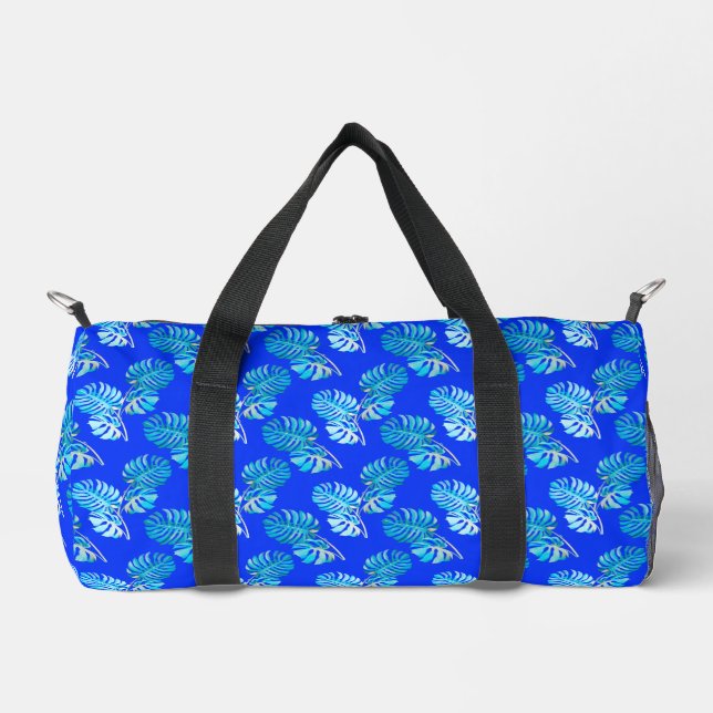 Kobaltblaue Monstera Brise Duffle Bag (Vorderseite)