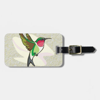 Kolibri im Flug auf strukturiertem Hintergrund Gepäckanhänger