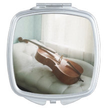 Kompakter Spiegel mit schöner Cellophotographie