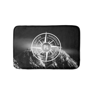 Kompass-Sternemblem monogramm dramatische Berge Badematte