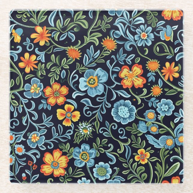 Komplexe Blumenkunst: Blaue und orangefarbene Blum Glasuntersetzer (Vorderseite)